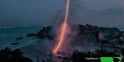 معجزه خلاقیت یک هنرمند چینی برای اختراع «نردبان آتشین» زمین و آسمان را به هم دوخت! شبی که آسمان آتش گرفت+فیلم