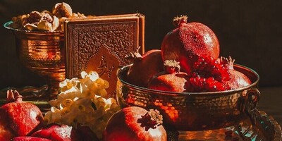 عکس / چگونگی زنده نگهداشتن سنت‌های باستانی ایران و آیین "شب یلدا" در تهران قدیم